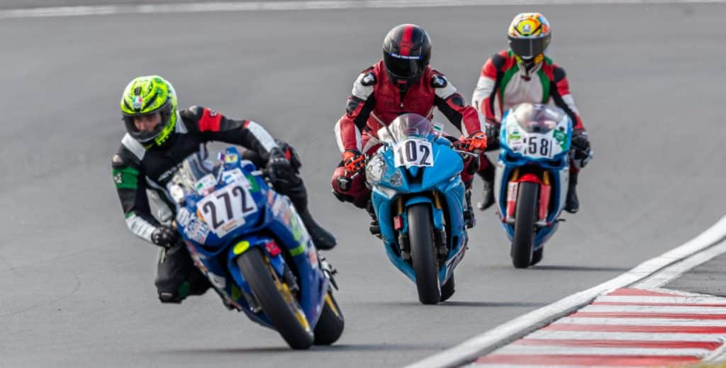 Faster cornering and lap times, as demonstrated by Denis taking an early lead into the first turn at Pertamina Mandalika International Street Circuit, Lombok, Indonesia.