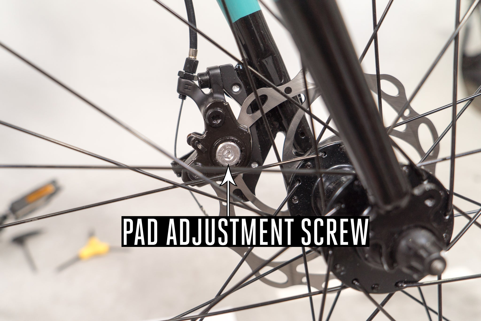Pad adjustment screw