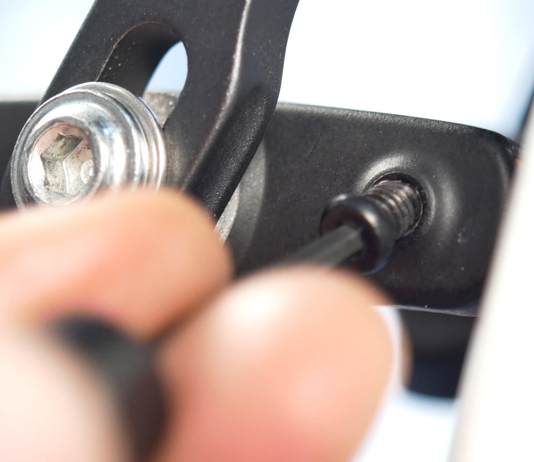 Remove any set screw before pushing pad from pad holder