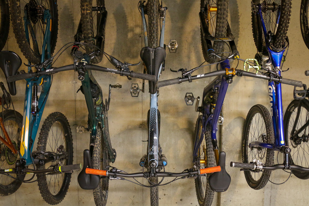 Motorcycles hanging from Park Tool storage hooks