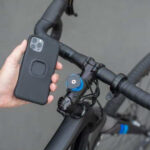 Quad Lock mounting system, showing the stem mount and a phone in the required case