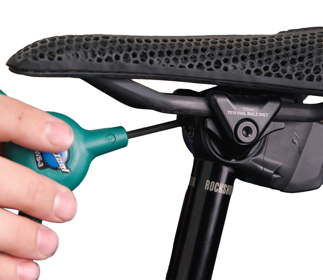 Seatpost with angle adjustment bolt