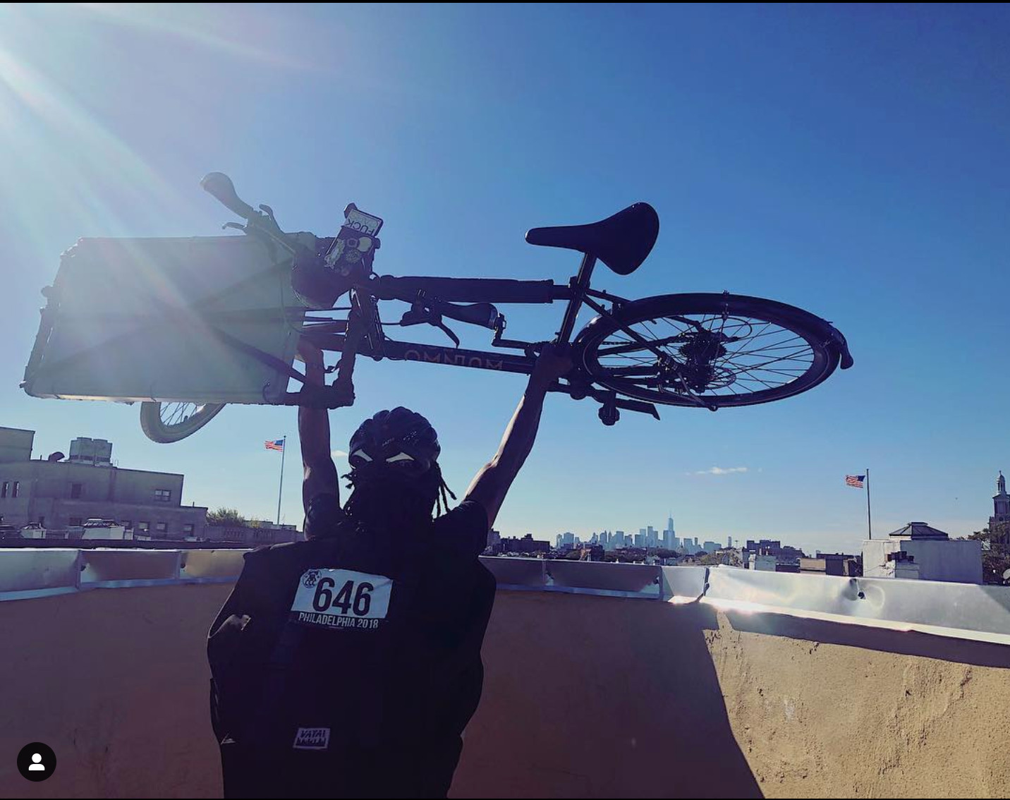Justin with his Omnium after winning 1st in the cargo race exemplifies the competitive spirit among bike messengers