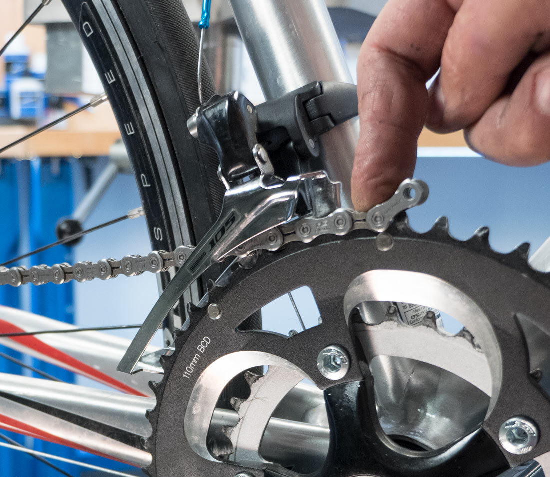 Pass chain through front derailleur