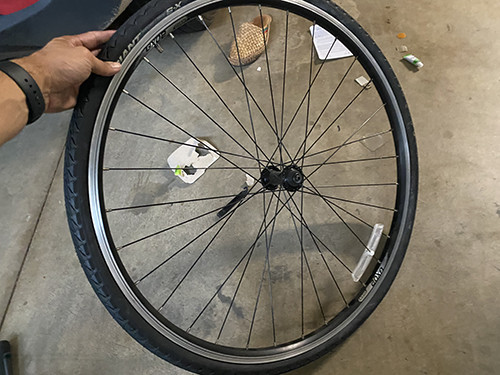 Putting the tire back on the wheel