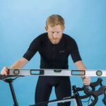 rider measures bike fit